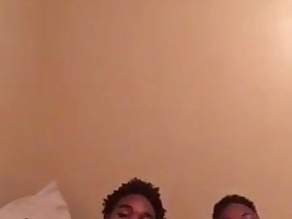 Two black friends playing